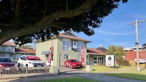 A building with a sign indicating it is a vacancy. - Eight Spence (Warrnambool)