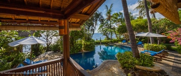 Outdoor pool, pool umbrellas, sun loungers