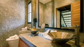 A bathroom with a large mirror, two bowls on the counter, and a towel rack. - Sea Dance Resort (Koh Samui)