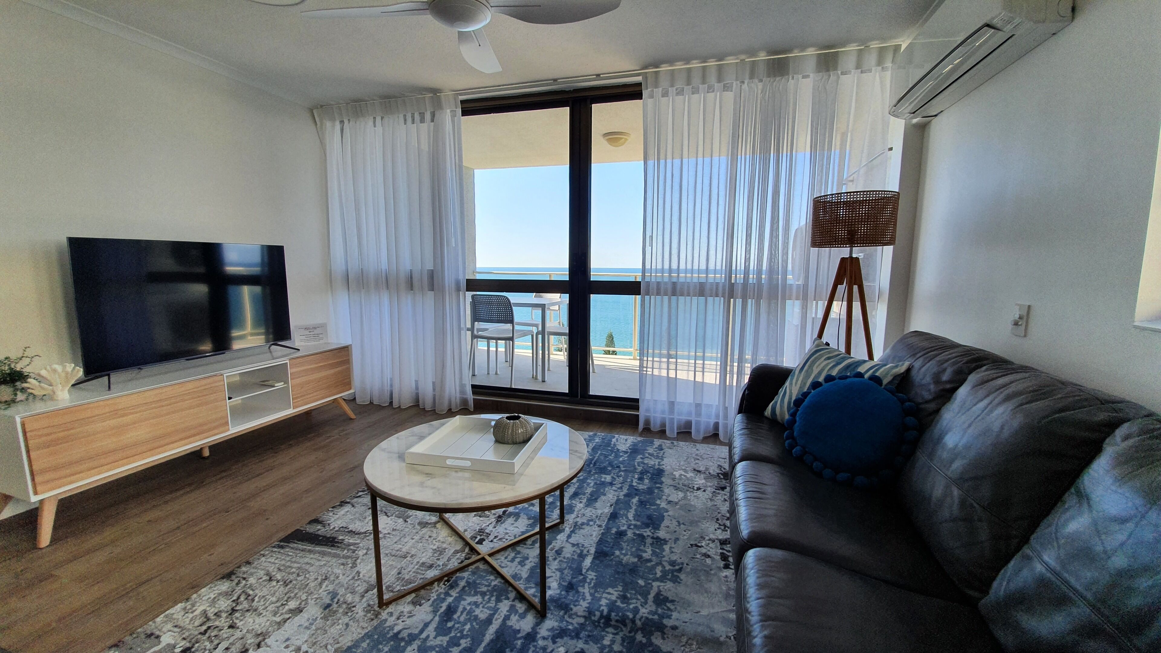 Superior 3 Bedrooms Beachfront Apartment  | Living area | Flat-screen TV, DVD player