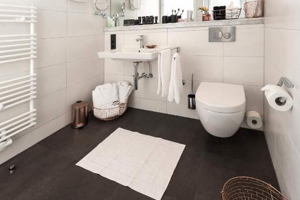 shower, designer toiletries, hair dryer, slippers