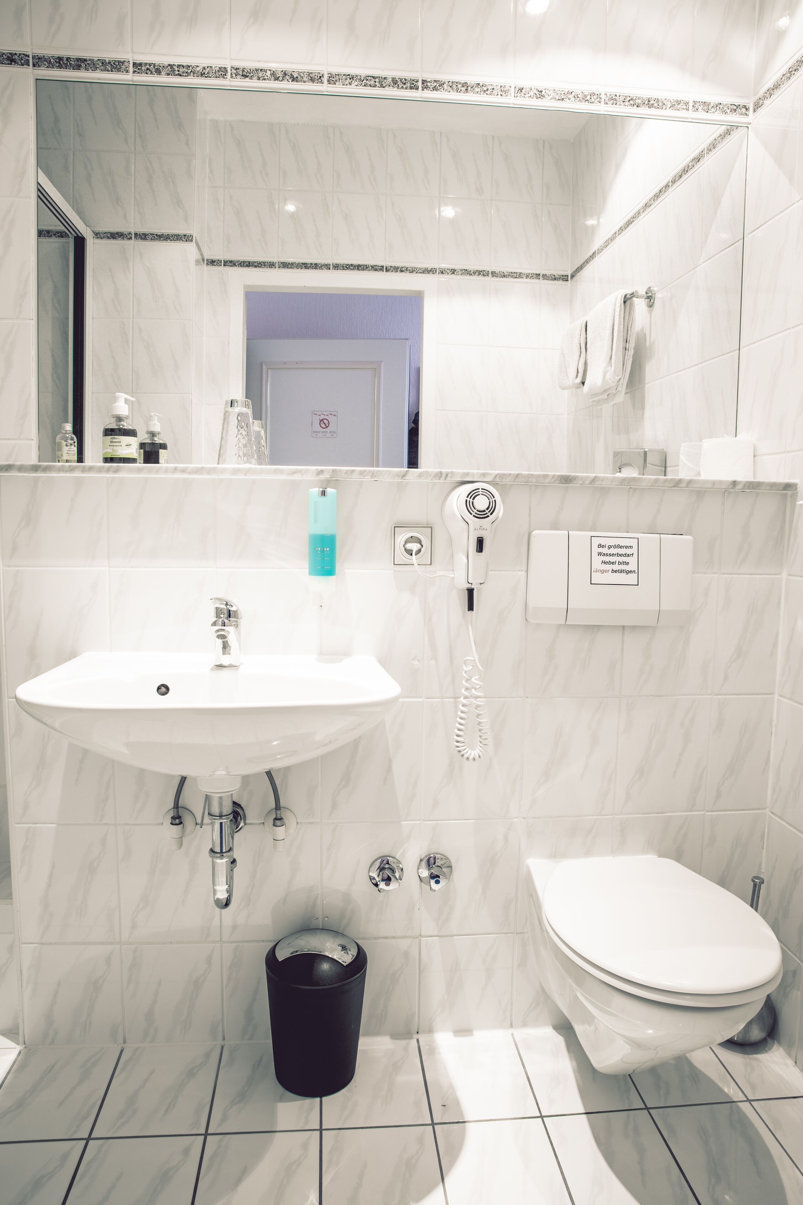 economy double room | bathroom | shower, designer toiletries, hair dryer, slippers