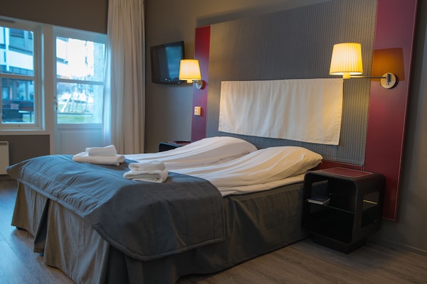 Pillowtop beds, blackout drapes, soundproofing, iron/ironing board