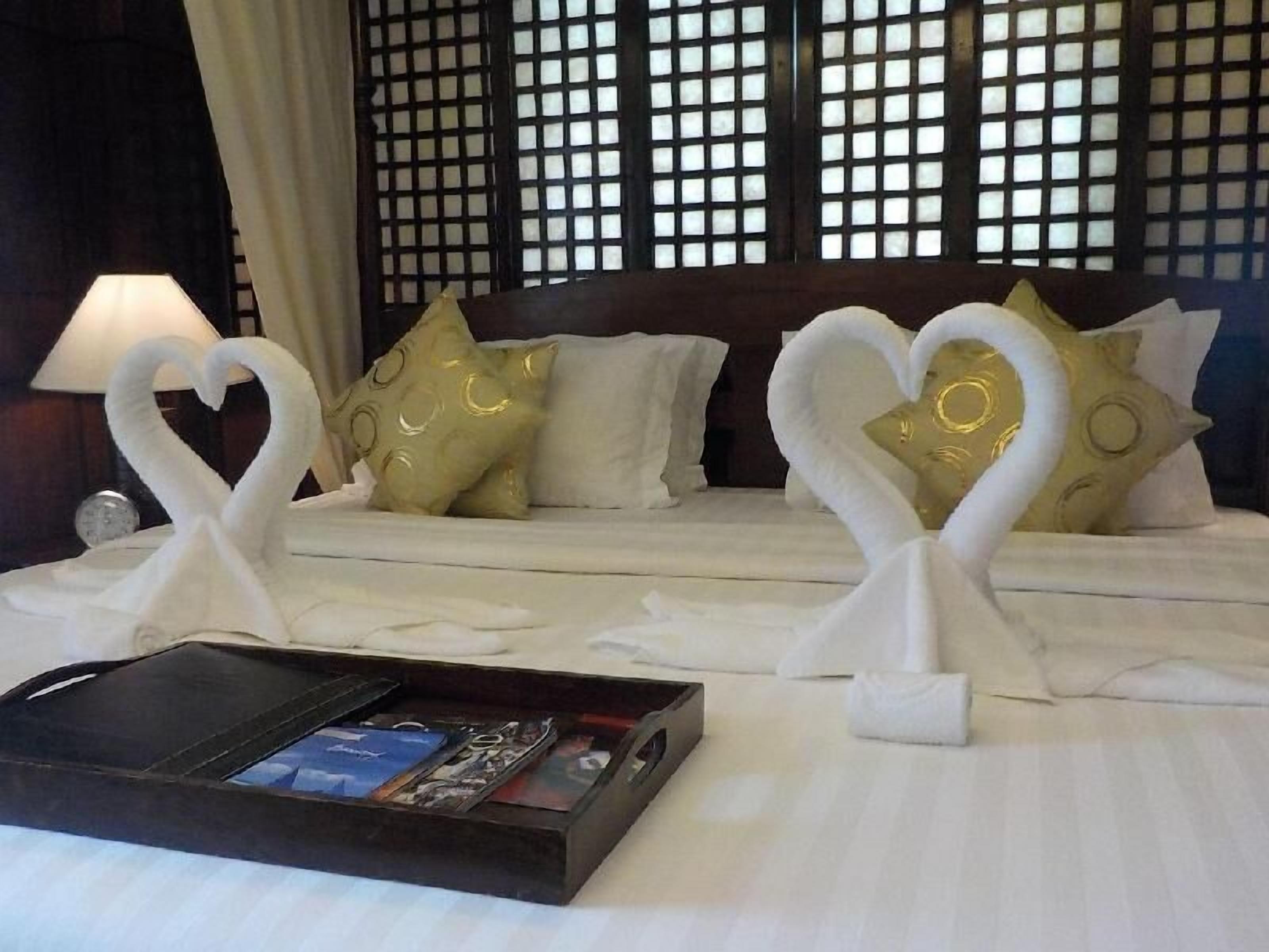 Copriletto in piuma, una cassaforte in camera, una scrivania