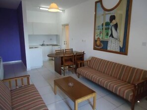 Apartment, 1 Bedroom | In-room safe, blackout drapes, soundproofing, iron/ironing board
