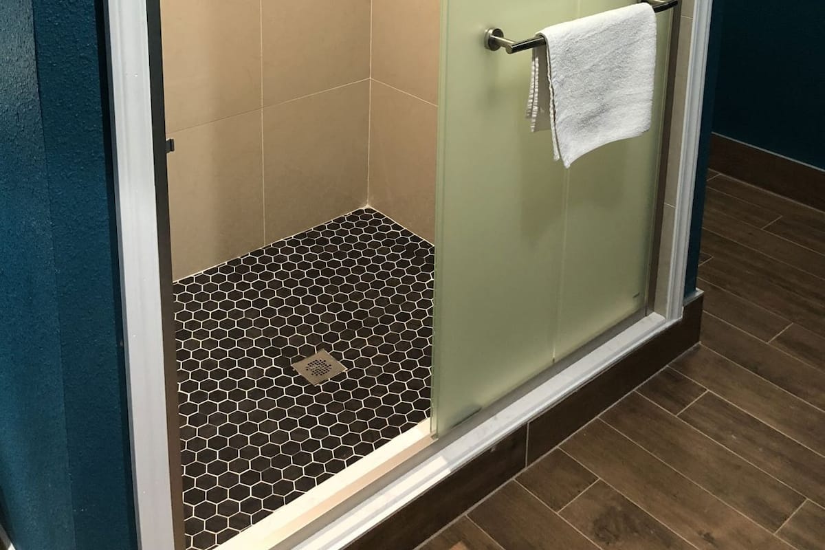 Bathroom | Shower, free toiletries, hair dryer, towels