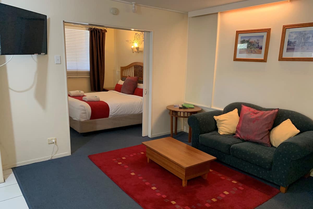 Executive Apartment, 1 King Bed, Kitchenette, Garden View | Premium bedding, individually decorated, individually furnished, desk