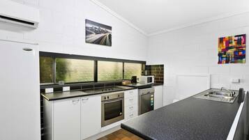 Standard Apartment, Multiple Beds, Non Smoking, Kitchen (Living Room) | Private kitchenette