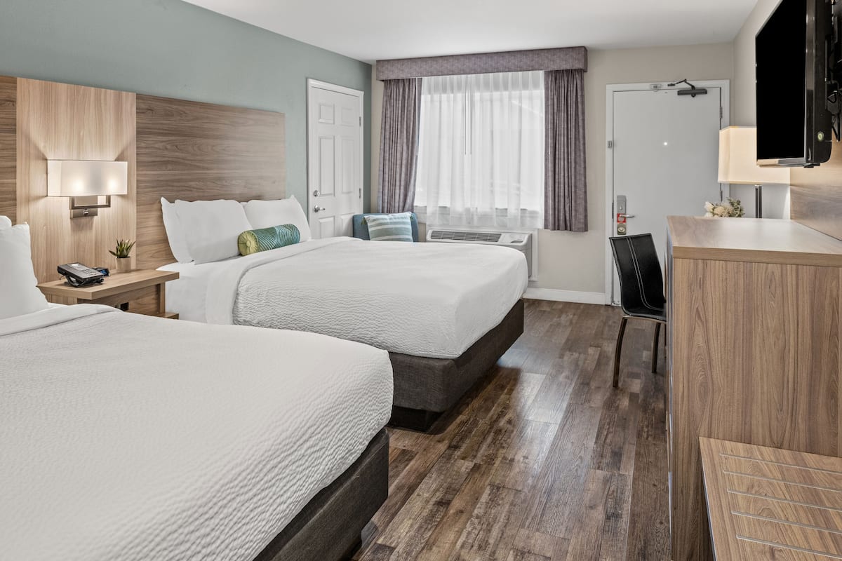 standard room, 2 queen beds | 1 bedroom, premium bedding, in-room safe, desk