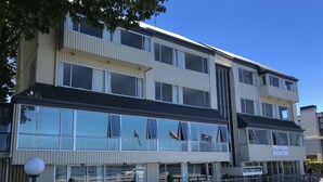 A multi-story building with a reception area at the ground level.