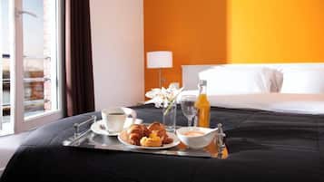 Premium bedding, desk, laptop workspace, soundproofing