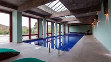 Indoor pool, outdoor pool, pool umbrellas, sun loungers