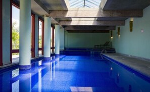 Indoor pool, outdoor pool, pool umbrellas, sun loungers