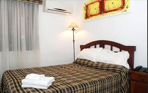 Premium bedding, down duvets, pillow-top beds, individually decorated - Laerte Hotel Mendoza (Mendoza)