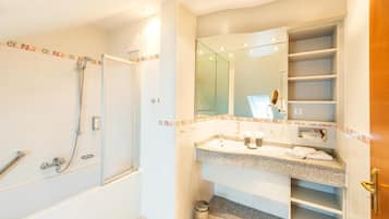Shower, hair dryer, bathrobes, slippers