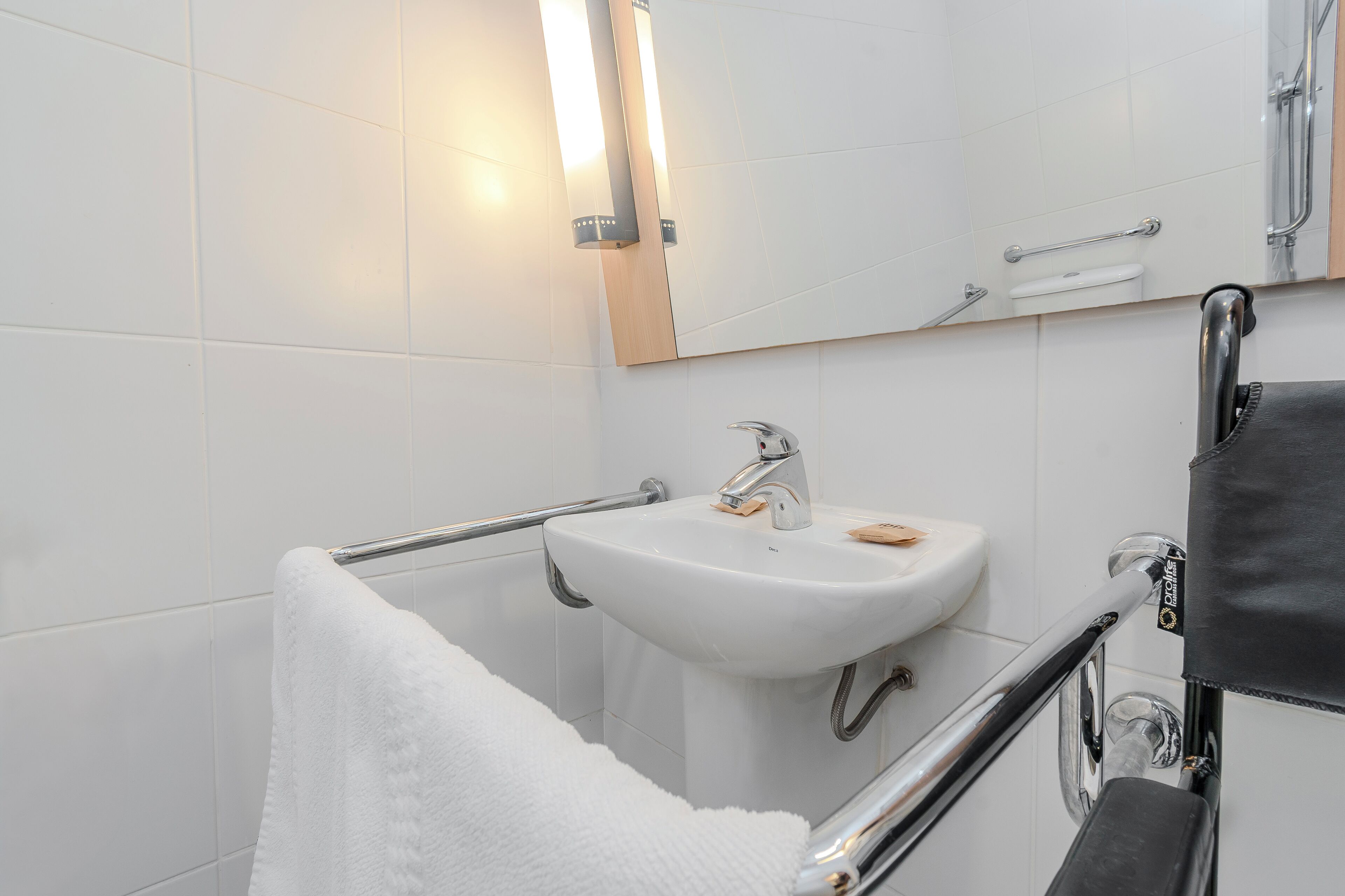 shower, eco-friendly toiletries, hair dryer, towels