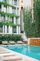 Outdoor pool, pool umbrellas, sun loungers