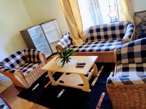 Apartment, 1 Bedroom | Living room | -20-inch TV with premium TV channels - Chamiachi Luxury Apartments (Mombasa)