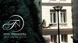 A building with a logo and text indicating it is Hotel Terranostra in Valparaiso, Chile. - Hotel Terranostra (Valparaiso)