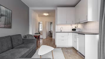 Suite familiare | 1 camera, con stile personalizzato, una scrivania, ferro/asse da stiro