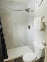 Deluxe King Suite | Desk, laptop workspace, bed sheets