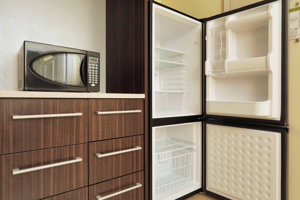 hypo-allergenic bedding, blackout curtains, iron/ironing board