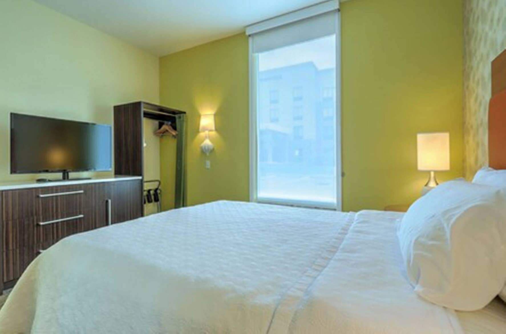 Hypo-allergenic bedding, blackout drapes, iron/ironing board, free WiFi