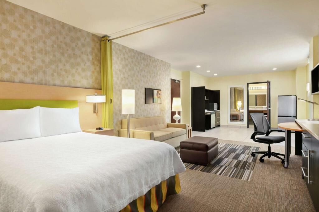 Hypo-allergenic bedding, in-room safe, laptop workspace