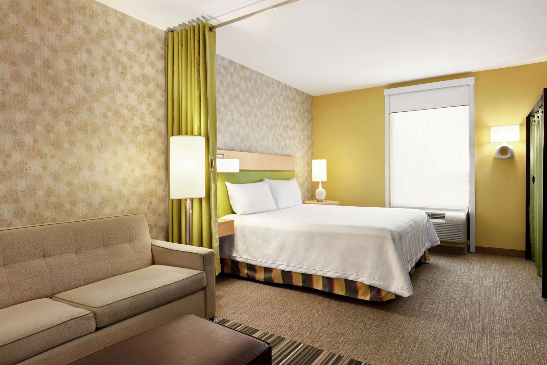 Hypo-allergenic bedding, in-room safe, laptop workspace