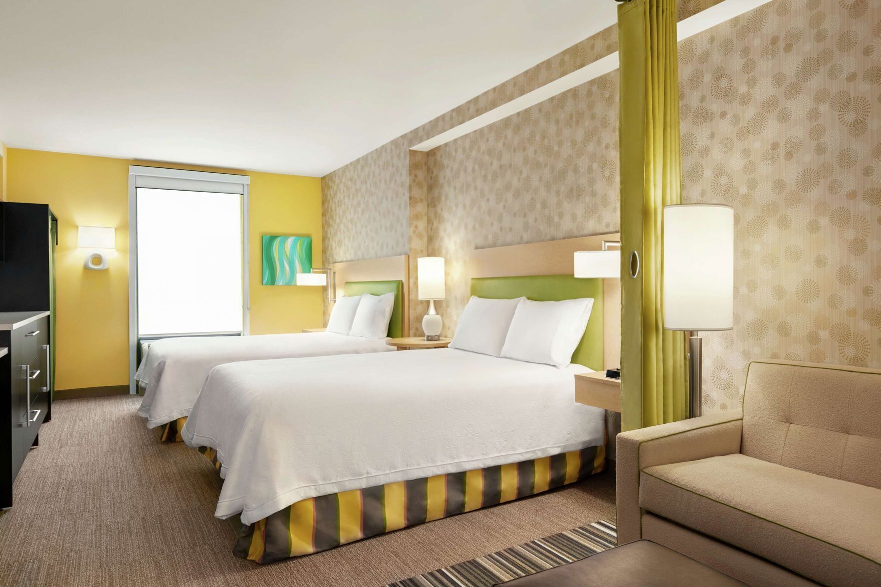 Hypo-allergenic bedding, in-room safe, laptop workspace