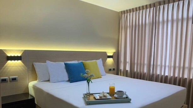 Superior Suite | Minibar, WiFi (free), bed sheets - Acuario Hotel & Suites (Santiago de Surco)