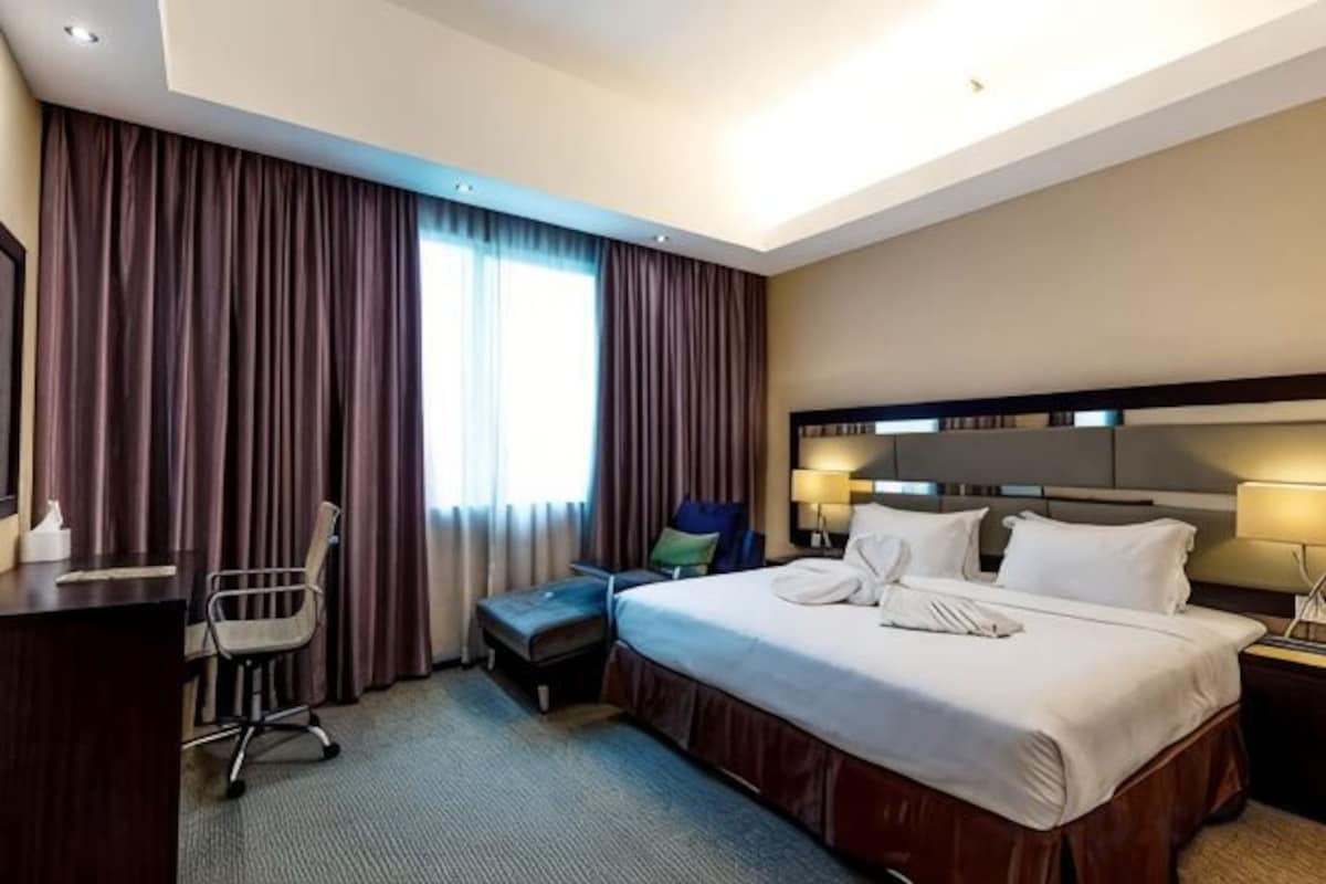 Hypo-allergenic bedding available, in-room safe, desk, laptop workspace