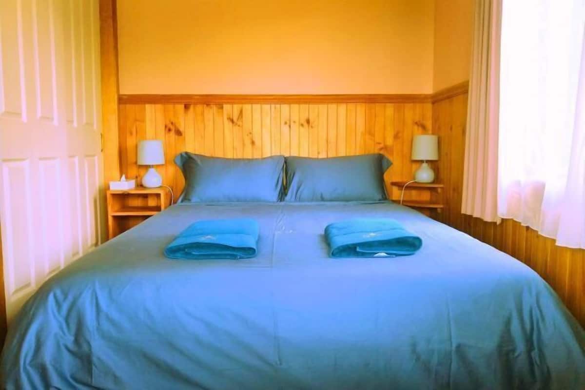 1 bedroom, desk, blackout drapes, iron/ironing board