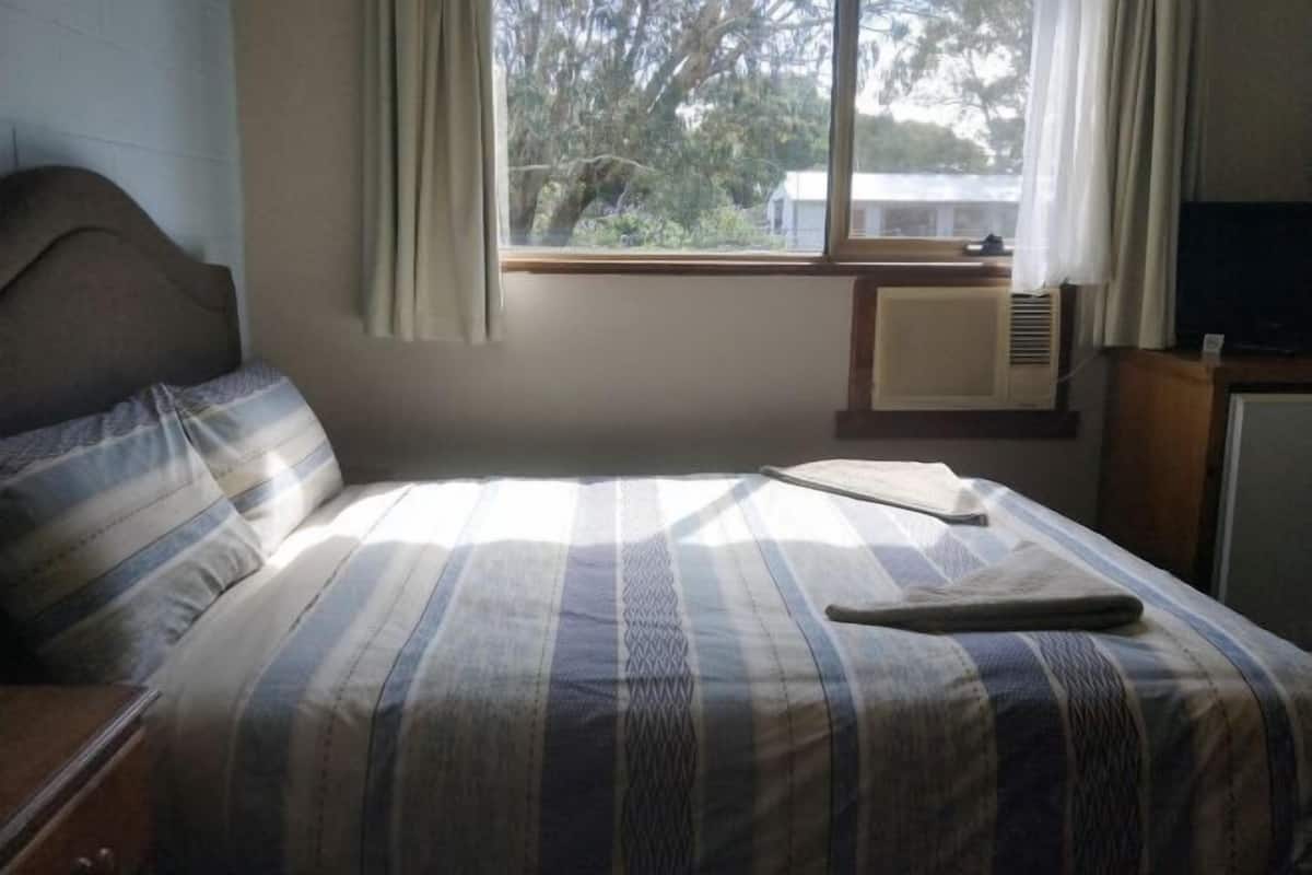 1 bedroom, desk, blackout drapes, iron/ironing board