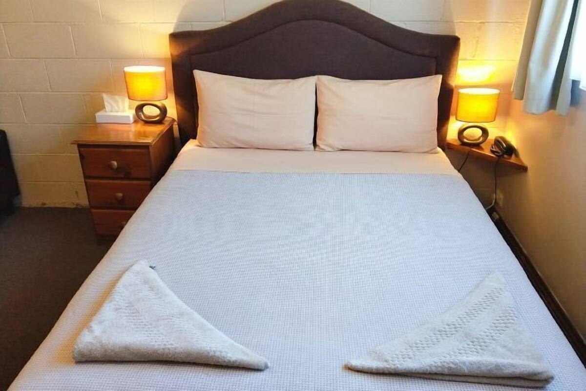 1 bedroom, desk, blackout drapes, iron/ironing board
