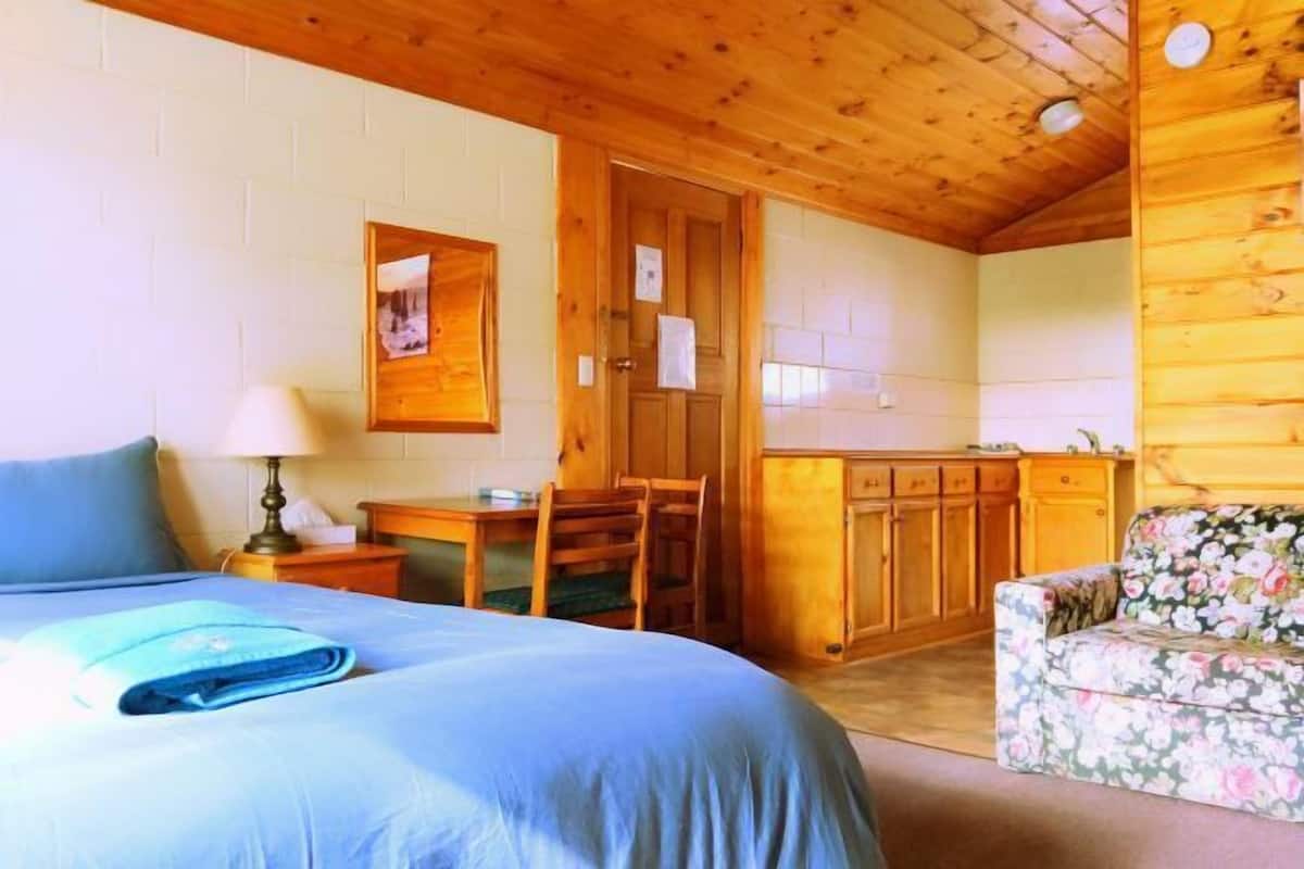 1 bedroom, desk, blackout drapes, iron/ironing board