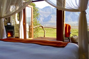 Suite familiar, balcón, vista a la laguna | Ropa de cama de alta calidad y artículos del minibar gratis 