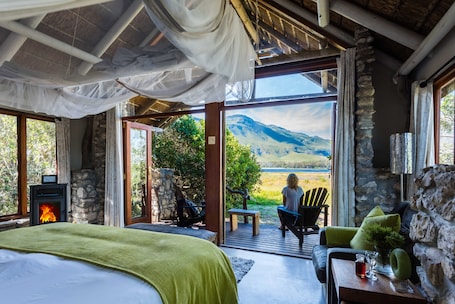Luxury Suite, 1 King Bed, Balcony, Lagoon View | Balcony. Mosaic Lagoon Lodge