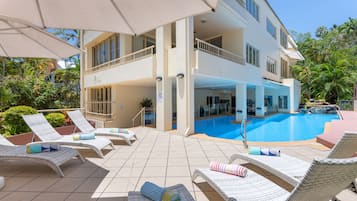 Outdoor pool, open 8:00 AM to 8:00 PM, pool umbrellas, pool loungers