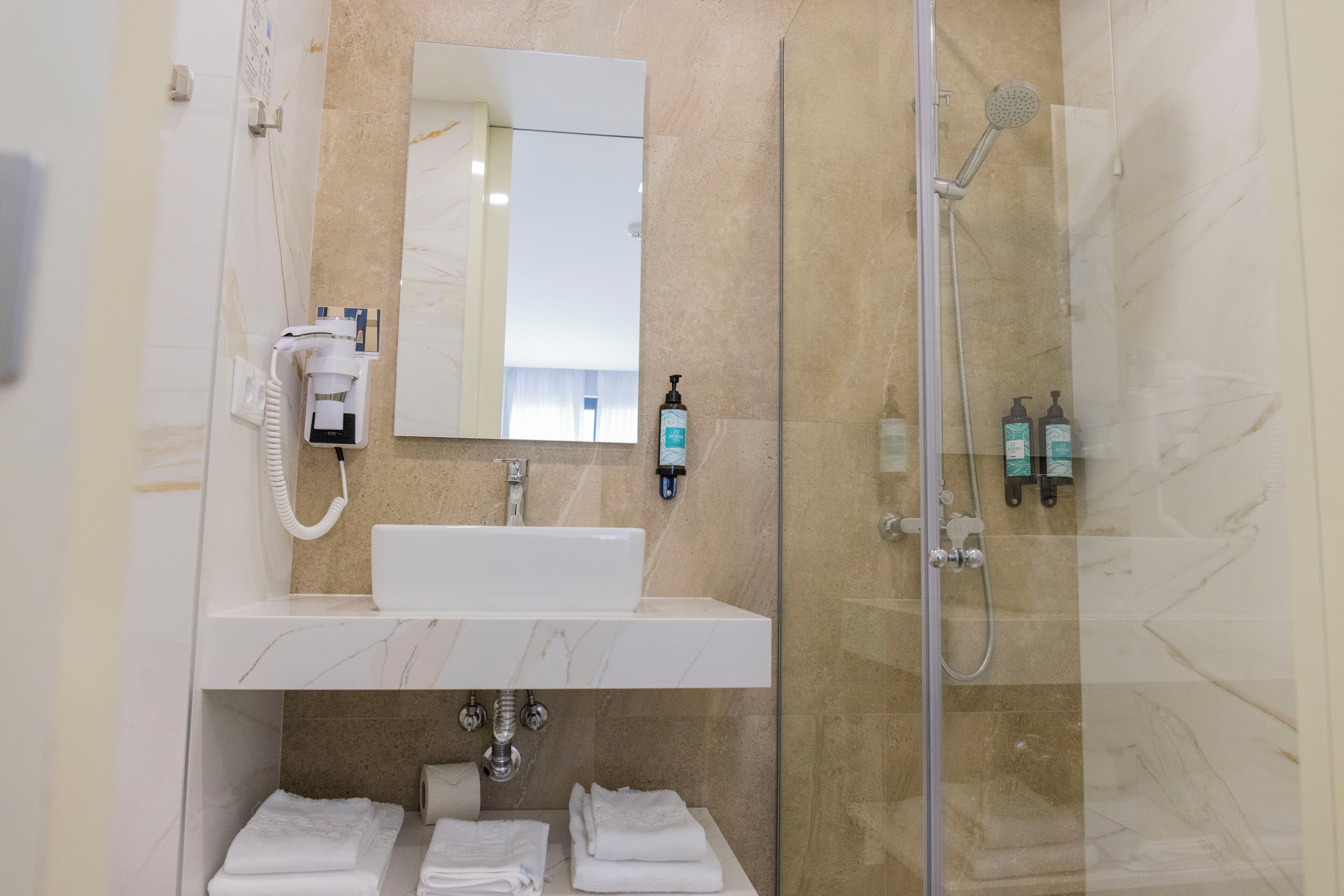 free toiletries, hair dryer, towels