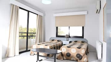 Studio (for 2) | Living area | Flat-screen TV