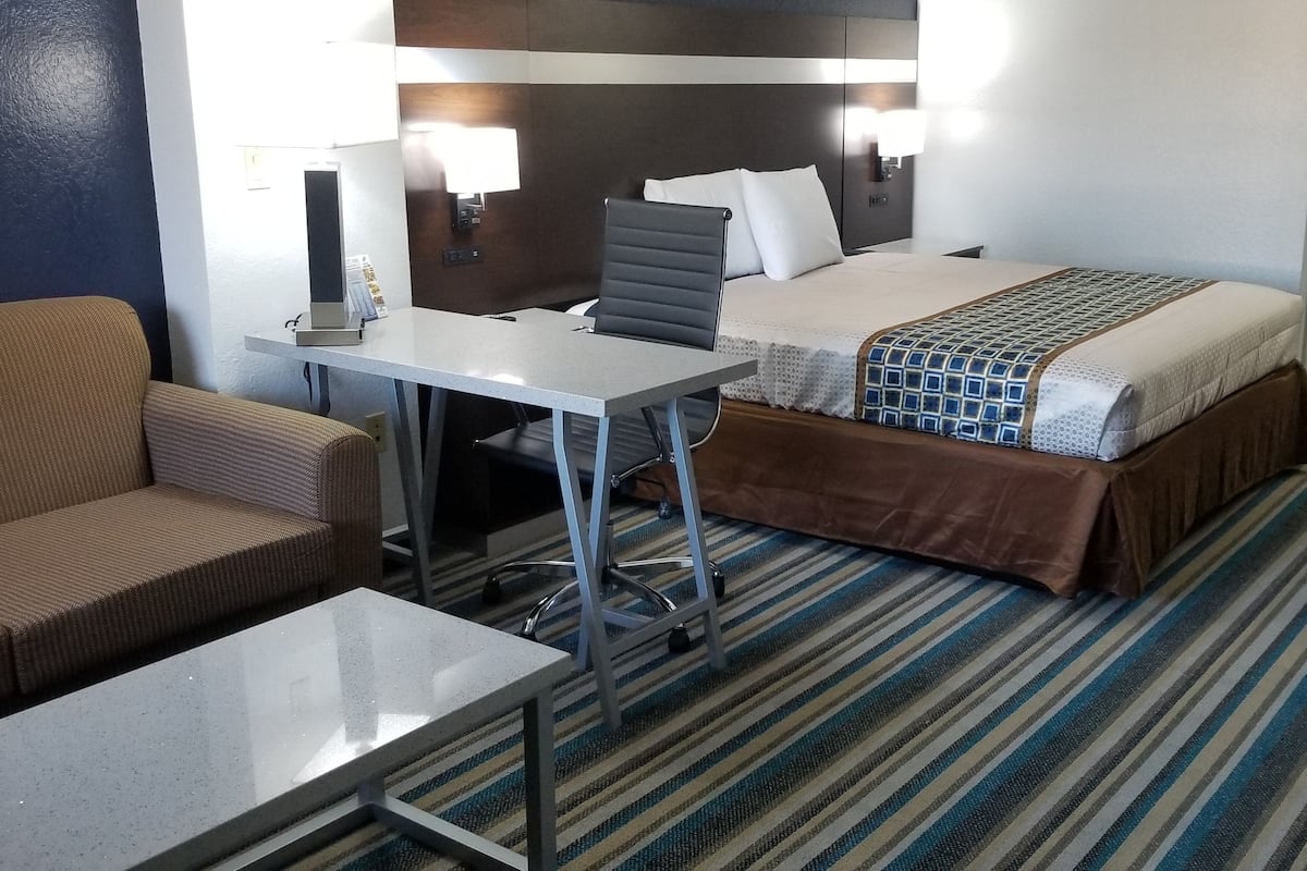 Standard Suite, 1 King Bed, Non Smoking | In-room safe, iron/ironing board, free WiFi, alarm clocks