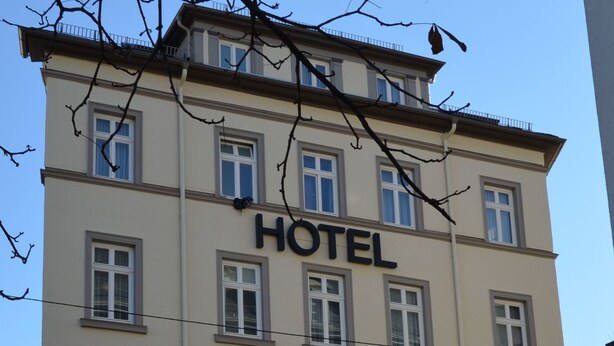 A multi-story hotel with a sign reading "HOTEL Am Wilhelmsplatz." - Hotel am Wilhelmsplatz (Stuttgart)