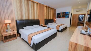 Premium bedding, desk, blackout curtains, rollaway beds