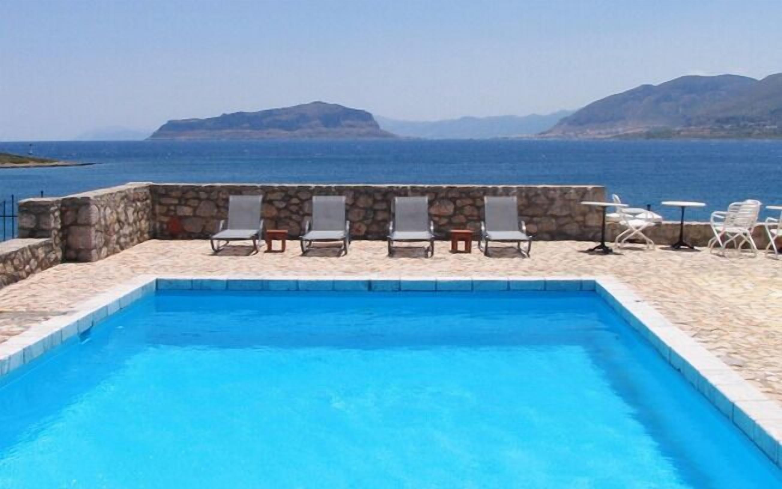 outdoor pool, pool umbrellas, pool loungers