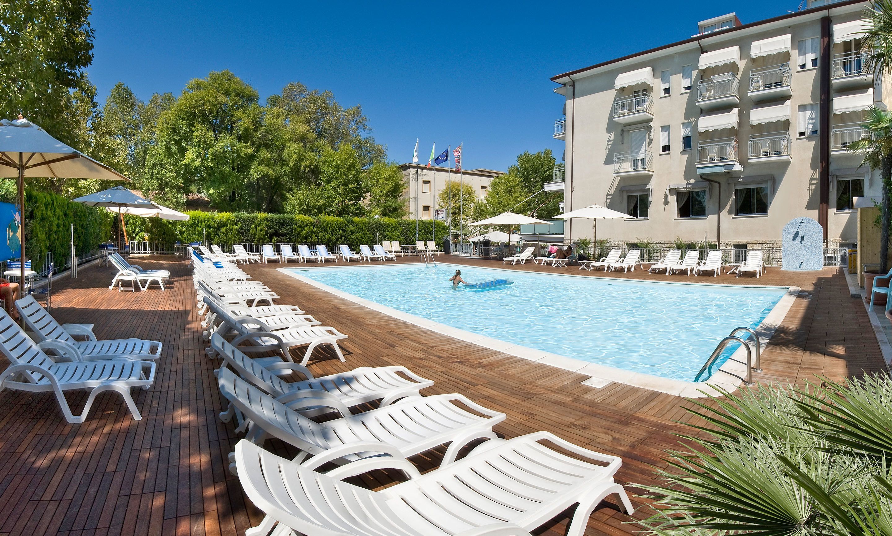 outdoor pool, pool loungers