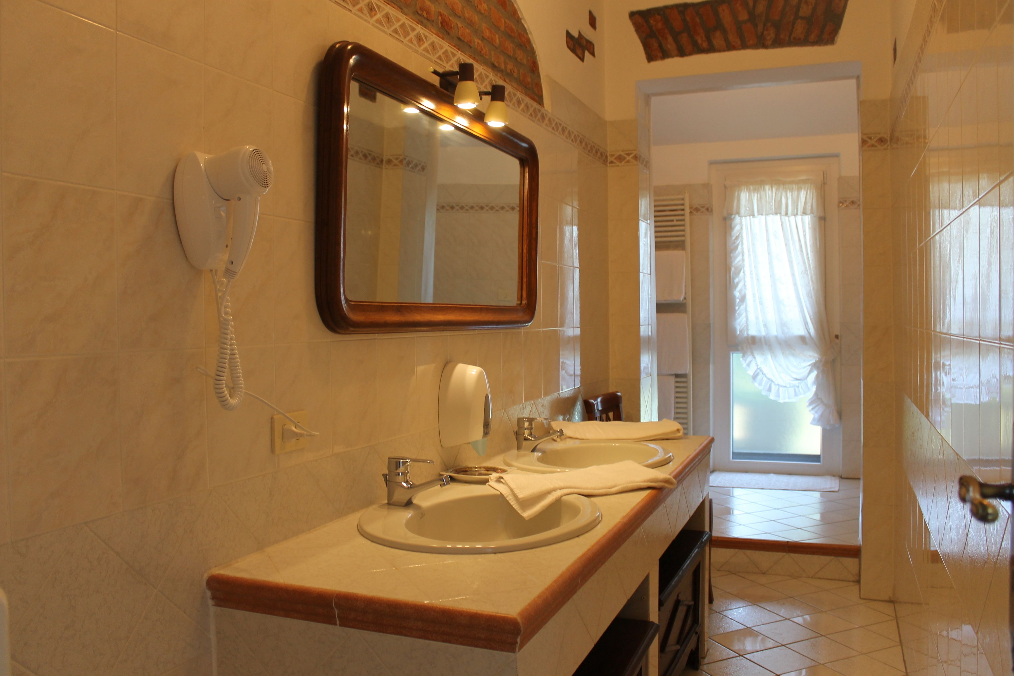 hair dryer, bidet, towels