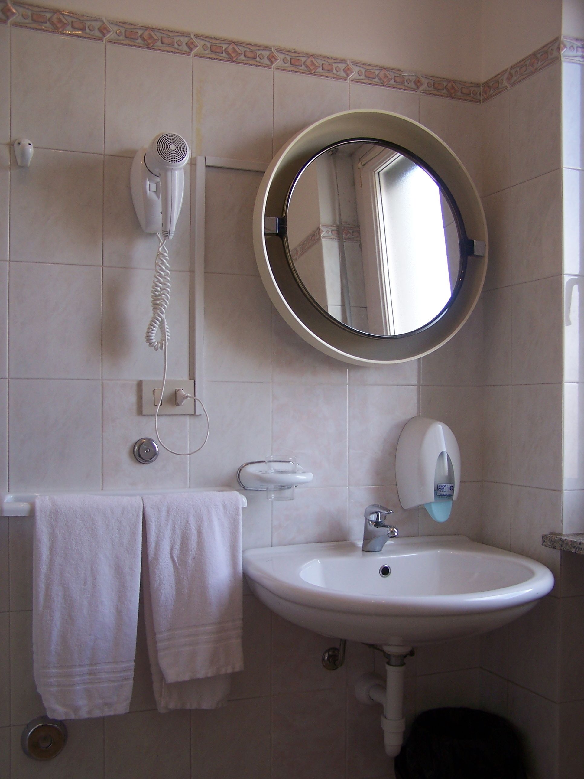 hair dryer, bidet, towels