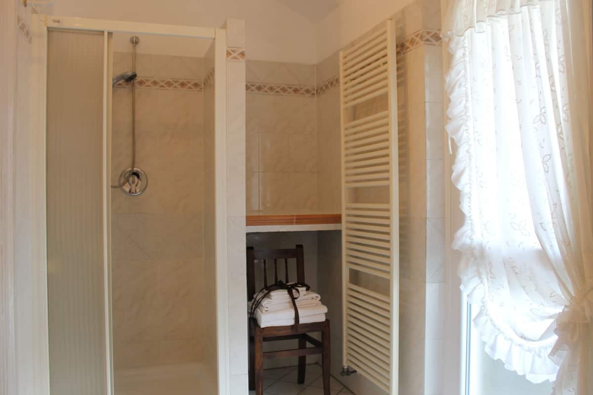 hair dryer, bidet, towels