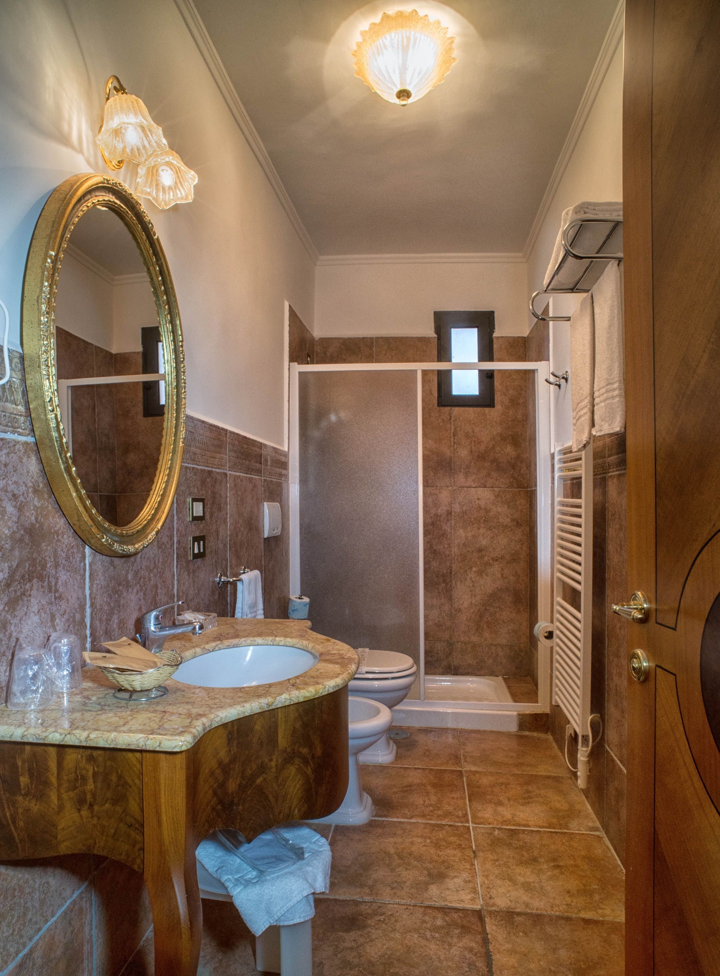 shower, free toiletries, hair dryer, slippers